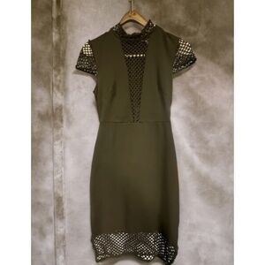 Black dress with net décolleté